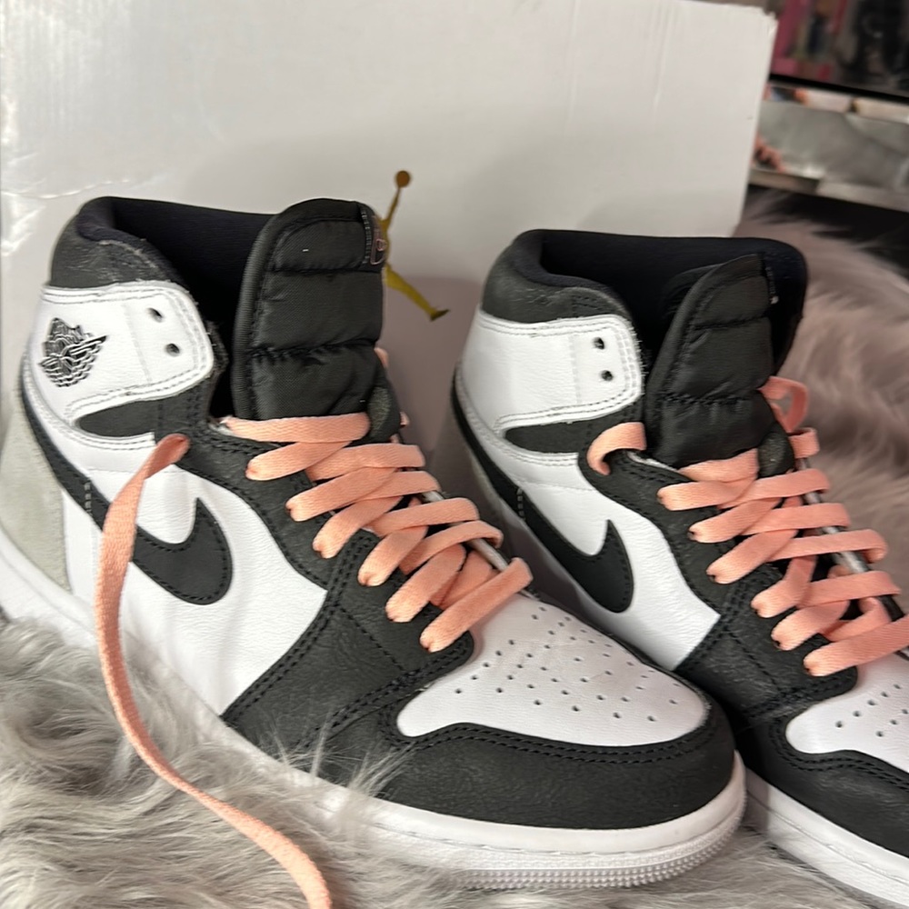 Air Jordan women’s high tops black and white with pink laces